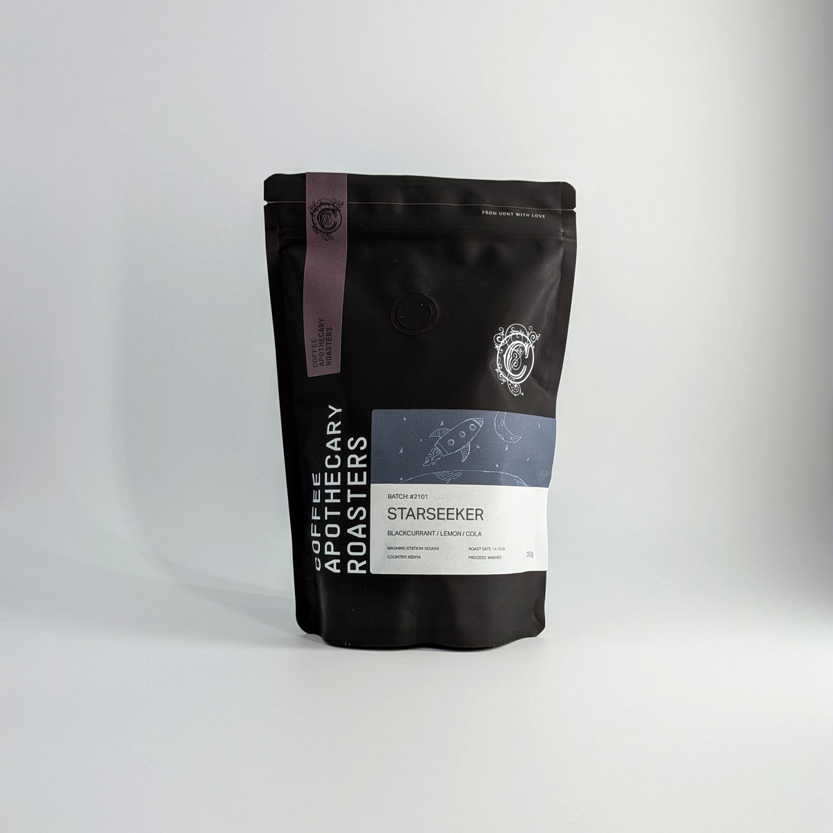 A black stand-up pouch of coffee from Coffee Apothecary Roasters, specifically the Starseeker variety, set against a plain light gray background.